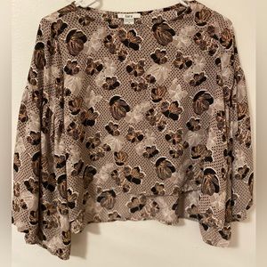 Woman Black and Tan Blouse with Pattern